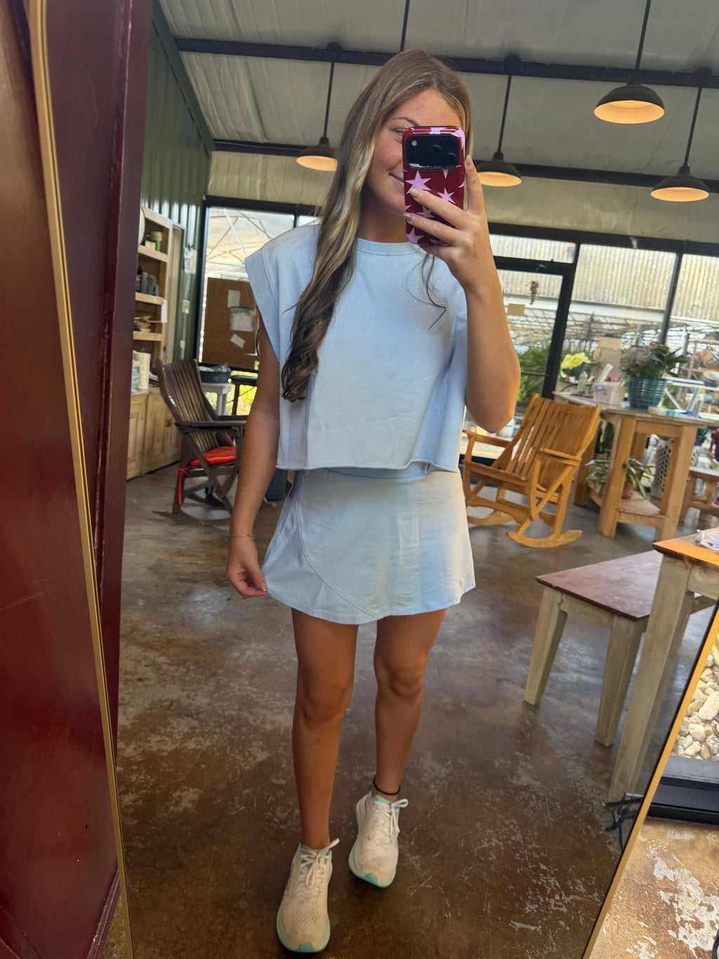 Light blue open back top.