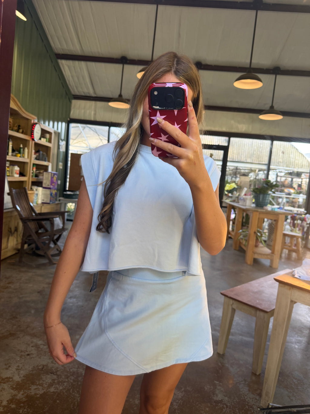Light blue open back top.