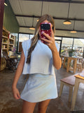 Light blue open back top.